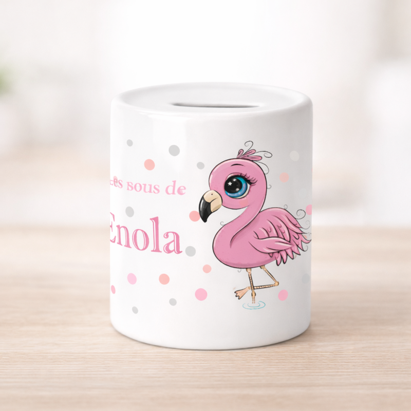 Tirelire personnalisée pour baptême avec prénom: flamme rose flamingo sur fond clair à pois, texte gravé au prénom.
